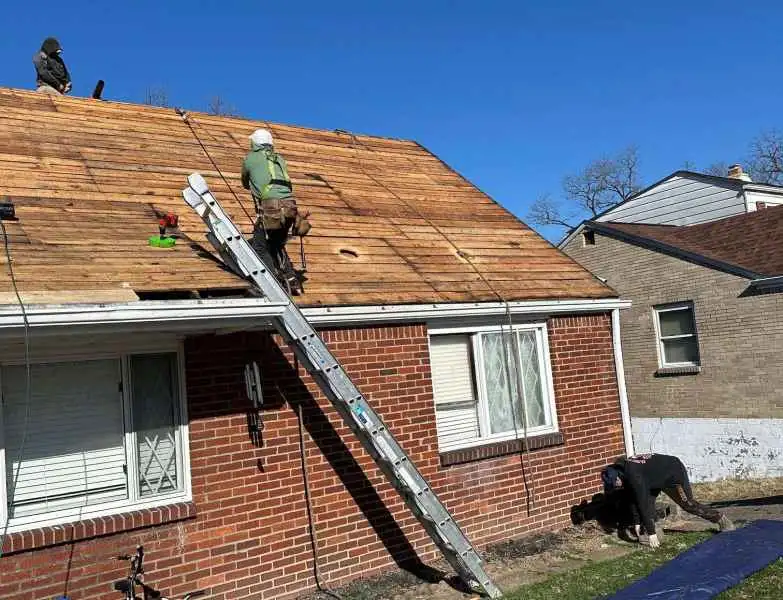 Roofers on North Pittsburgh Roof